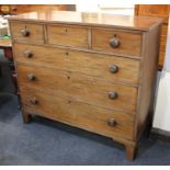 A 19th century mahogany chest of three short over three graduated drawers with string inlay and knob
