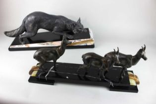 An Art Deco style bronzed metal model of three deer on onyx and marble base 53cm long, together with
