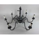 An Albert Bertram Dutch style pewter finish six branch chandelier light fitting 71cm wide (a/f)