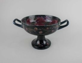 A Moorcroft pottery Pomegranate pattern two-handled tazza 15cm high (a/f - restored)