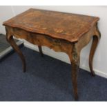 A Dutch floral marquerty inlaid walnut card table with swivel folding top enclosing circular green