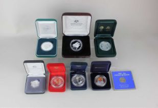 A collection of eight cased silver proof commemorative coins including a Perth Mint Sydney