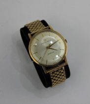 An Eternamatic Centenaire 9ct gold circular cased gentleman's wristwatch with a signed automatic
