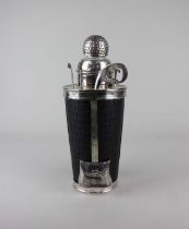 A novelty plated cocktail set in the form of a golf bag containing shaker with golf ball finial,
