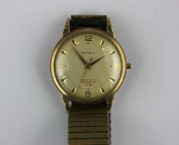 A 9ct gold cased gentleman's Mappin Automatic Incabloc U M wristwatch on gilt metal expanding strap