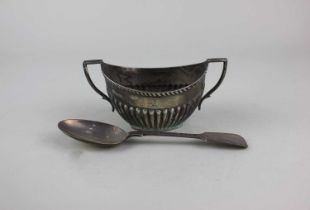 A Victorian silver two handled sugar bowl boat shape with demi reeding, maker James Deakin & Sons,