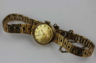 A Rotary 9ct gold ladies bracelet wristwatch, the signed gilt dial with gilt hour markers fitted