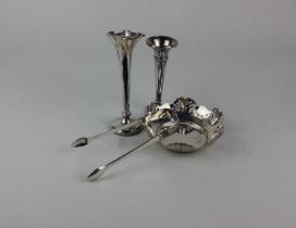 A pair of George III silver sugar tongs London 1807, a George V silver circular sweet dish with
