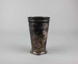 A Victorian Britannia silver vase tapered form with hammered decoration and engraved scroll band