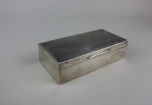 A modern silver cigarette box rectangular shape with engine turned engraved lid, maker Mappin &