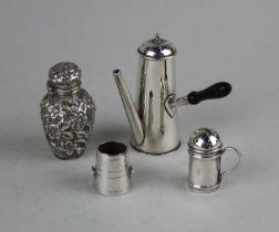 A Victorian silver pepperette modelled as a miniature chocolate pot maker Cornelius Desorneaux
