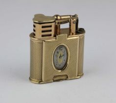 A Dunhill 9ct gold cased petrol lighter incorporating a watch compartment, the unsigned oval dial