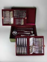 A Swiss twelve setting silver plated canteen in fitted three tier case (a/f - some blades