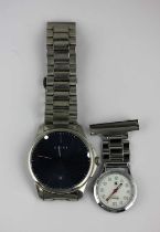 A Gucci steel gentleman's bracelet wristwatch, the signed blued dial with centre seconds and with