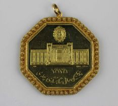 An Iran octagonal gold medallion 1976 commemorating the 50th Anniversary of the Pahlavi Dynasty,