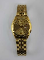 A Seiko5 rolled gold date automatic wristwatch