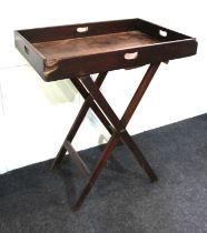 A 19th century mahogany rectangular butler's tray on folding stand 79cm (a/f)
