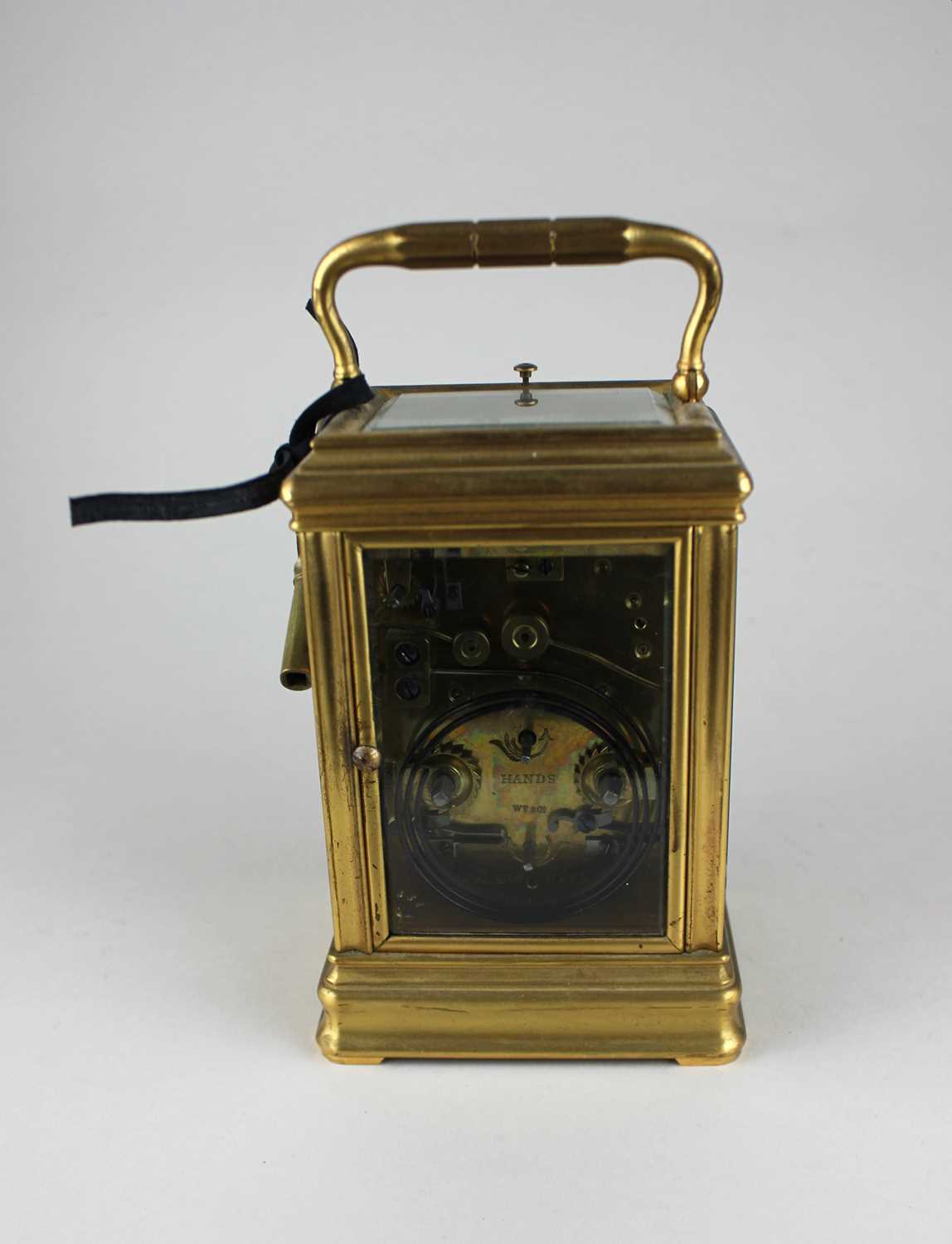 A 19th century gilt metal cased repeating carriage clock, the white enamel dial signed W Thornhill & - Image 5 of 5