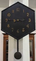 A hexagonal oak drop dial wall clock with Arabic numerals, 41cm diameter