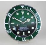 A Rolex advertising wall clock the dial marked 'Rolex Oyster Perpetual Date Deepsea Sea-Dweller