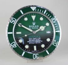 A Rolex advertising wall clock the dial marked 'Rolex Oyster Perpetual Date Deepsea Sea-Dweller