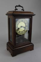 A German HAC 14 day mantle clock, striking on a gong, 41cm high, with key