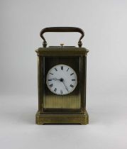 A 19th century gilt brass repeating carriage clock, the floral decorated case with bevelled glass