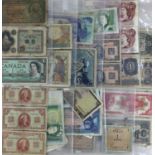 A collection of British and international bank notes to include Bank of England, Reichsbanknote,