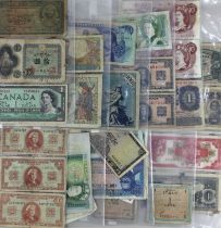 A collection of British and international bank notes to include Bank of England, Reichsbanknote,