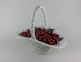 A ceramic model of a fruit basket filled with red cherries 40cm high