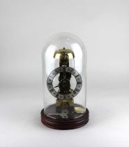 A Franz Hermle brass skeleton clock striking on a bell, numbered 791-080, 22cm high, with key and