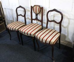 A pair of Victorian balloon back salon chairs on cabriole legs and a rosewood chair with panel