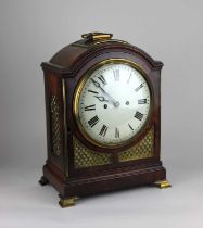 A George III brass mounted mahogany bracket clock, the unsigned circular enamel dial with Roman