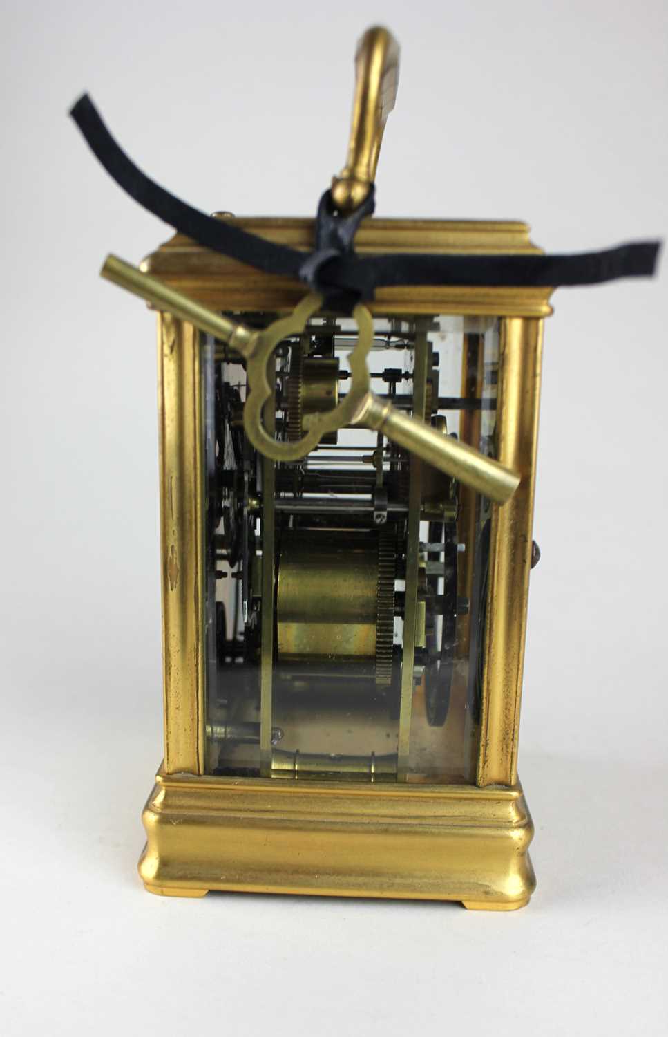 A 19th century gilt metal cased repeating carriage clock, the white enamel dial signed W Thornhill & - Image 4 of 5