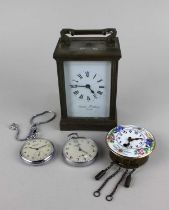 A brass cased carriage clock the white enamel dial signed Charles Frodsham London 15cm high, with