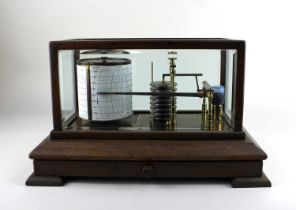 A Chadburns Ltd Liverpool barograph in wood and bevelled glass case, with drawer containing blank