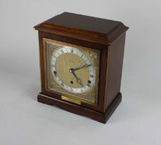 An Elliott mahogany cased chiming mantle clock retailed by W Perry & Co Birmingham, presented to