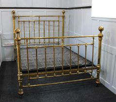 A Victorian style brass double bed with head and foot board and spring base approx 158cm by 214cm