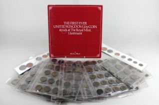 A collection of British and World coins, to include The First Ever United Kingdom 20p Coin Struck at