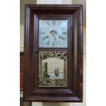 A Jerome & Co American wall clock, the rectangular case with glazed panel door decorated with a