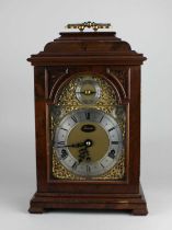 A 20th century George I style walnut chiming bracket clock in the manner of Daniel Quare by