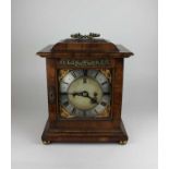 A George III style walnut bracket clock the six and a half inch dial with silvered chapter ring