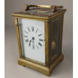 A French brass cased carriage clock, striking on a gong, 13cm high, no key