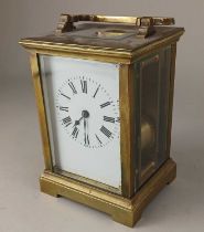 A French brass cased carriage clock, striking on a gong, 13cm high, no key