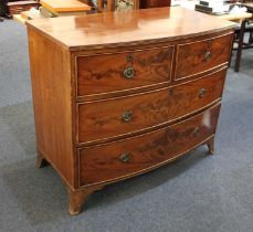 A 19th century mahogany bowfront chest of drawers, the top with reeded edge, two short over two long