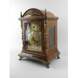 A Winterhalder and Hofmeier oak cased mantle clock, brass dial with silvered chapter ring and