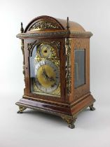 A Winterhalder and Hofmeier oak cased mantle clock, brass dial with silvered chapter ring and