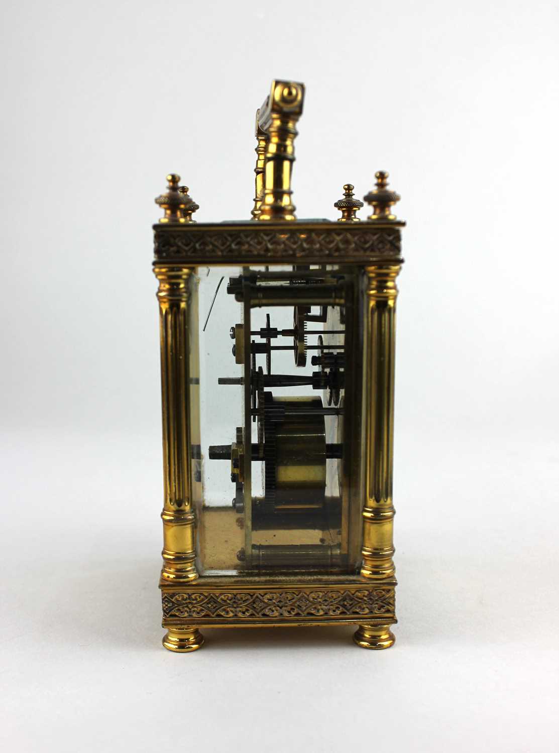 A gilt metal cased carriage clock, the architectural case with bevelled glass panels, white enamel - Image 2 of 5