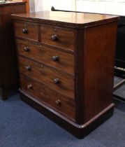 A Victorian mahogany chest of drawers, with rounded corners and with two short and three long