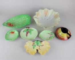 Seven items of Carlton Ware to include two lettuce leaf shaped dishes decorated with tomatoes, a